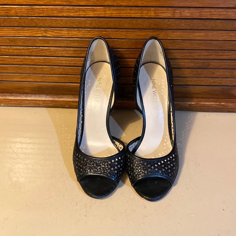 Black Heels. Nine W. peep toe heels. Excellent condition.